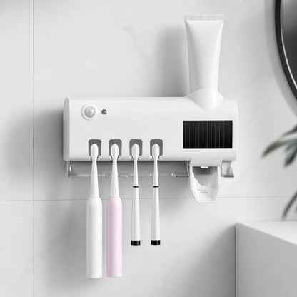 Porta cepillos blanco con dispensador de pasta luz UV y espacio para cuatro cepillos